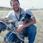 Thomas Aaron and his coonhound Roscoe. One of the best dog trainers in Denver