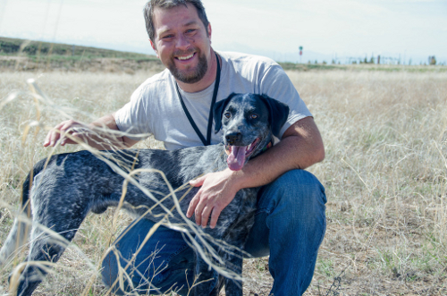 Thomas Aaron and his coonhound Roscoe. One of the best dog trainers in Denver